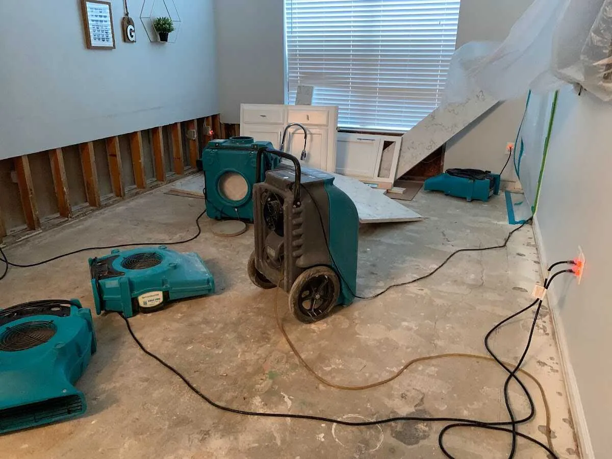 Dehumidifier in flood-cut room for Water Damage Restoration in Thomasville